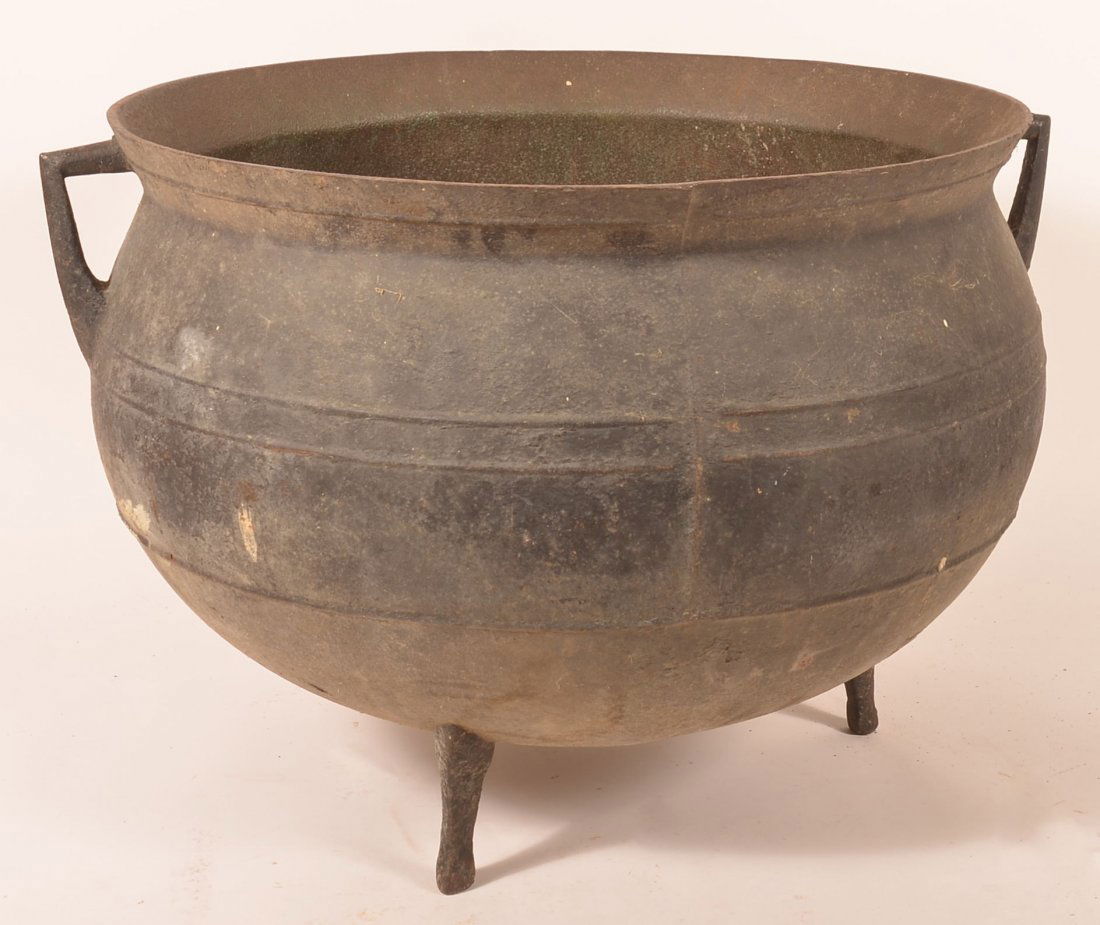 Antique 30 Gallon Cast Iron Gypsy Kettle.: Antique 30 Gallon Cast Iron Gypsy Kettle. 19"h. x 26" diam. Condition: Good with some rust and pitting.