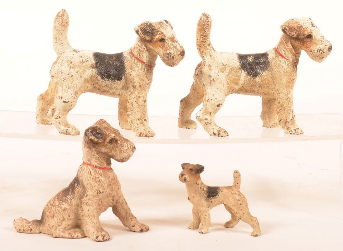 4 Hubley Wire Haired Fox Terrier Dog Figures. (1 of 2)