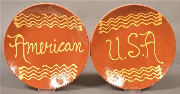 Two Breininger Pottery Slip Decorated Plates. (1 of 1)