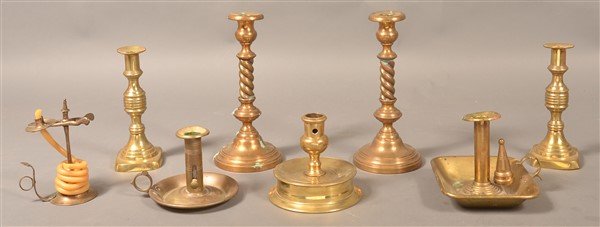 Grouping of Eight Antique Brass Candlesticks. (1 of 1)
