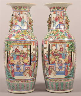 Pair of Chinese Famille Rose Palace Vases.: Pair of 19th Century Chinese Export Porcelain Famille Rose Palace Vases. Bulbous form wit elongated neck and flared rim, having foo dog figural handles. Decorated with two upper and two lower reserves