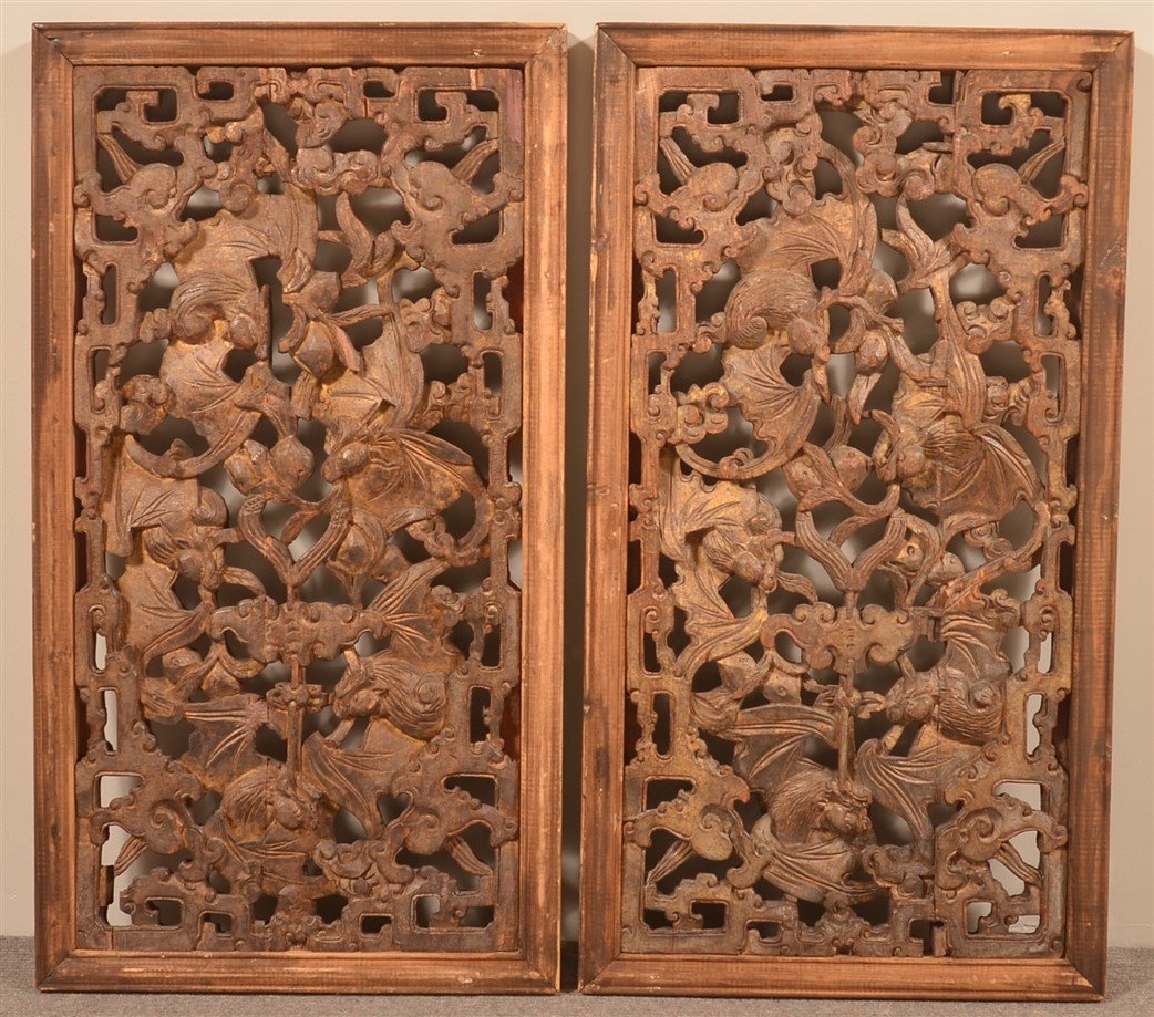 Pair of Chinese Carved and Gilt Wood Windows.: Pair of 19th Century Chinese Carved and Gilt Wood Windows. Elaborately carved with bats and scrolling lattice. 17-1/2" x 32". Condition: Good with wear.