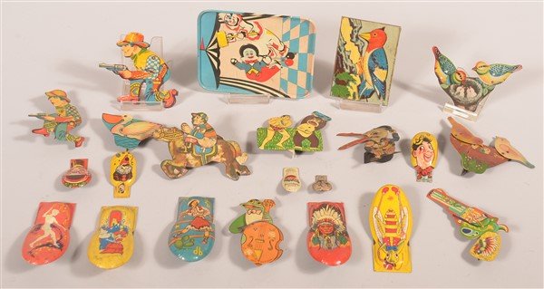 Lot of Vintage Tin Lithograph Clicker Noisemakers.: Lot of Vintage Tin Lithograph Clicker Noisemakers. Largest measures 5-1/2"h. Condition: Fair to very good.