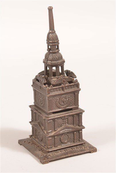 Cast Iron Tower Still Bank. (1 of 4)