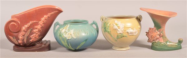 Four Pieces Of Roseville Art Pottery.: Four Pieces Of Roseville Art Pottery; Fox Glove Vase, Iris Vase, Poppy Vase and Water lily Cornucopia.4"-6-1/4"h. Condition: Good, Fox Glove Vase with nip.