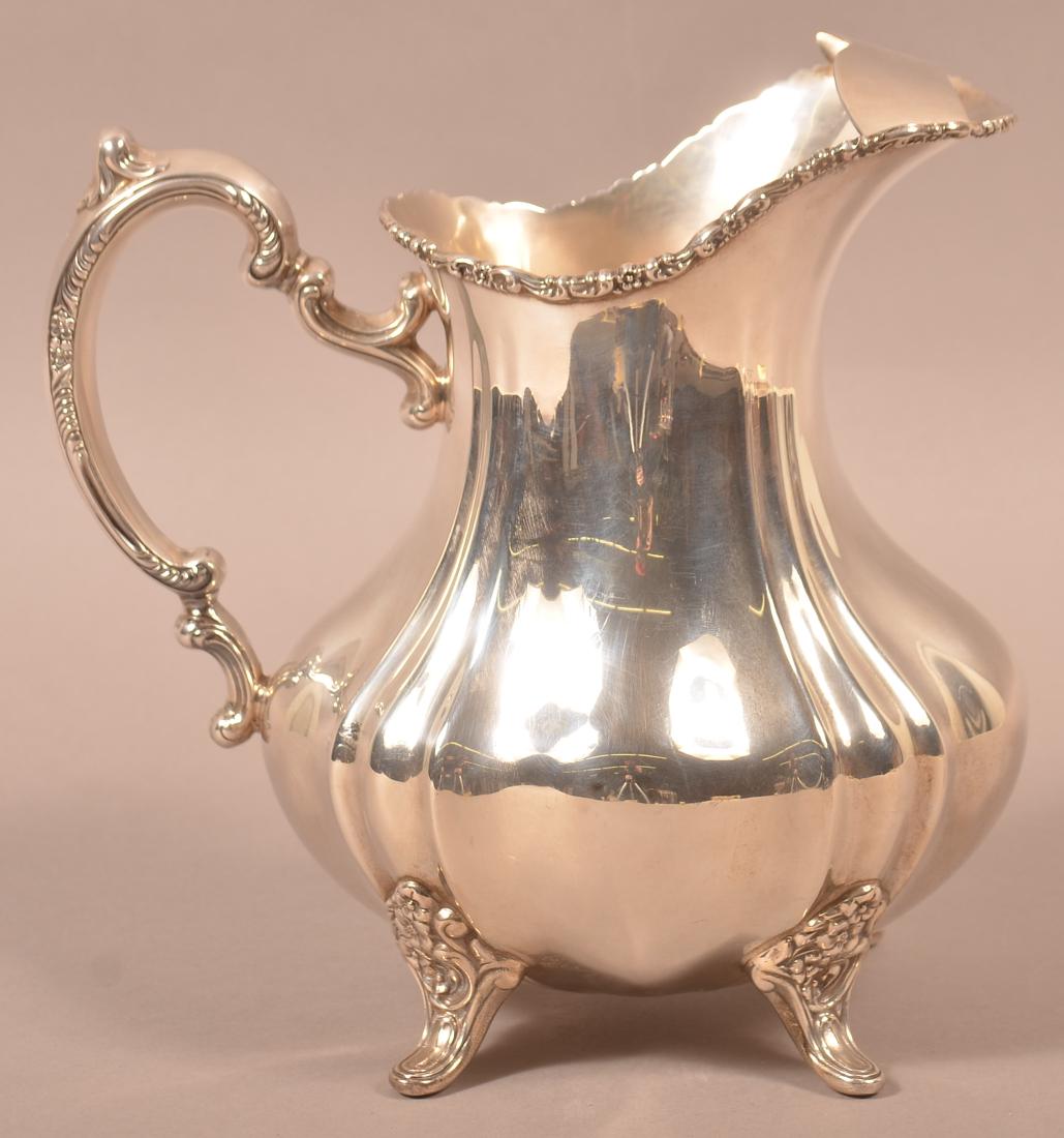 Poole Sterling Silver Footed Water Pitcher. (1 of 2)
