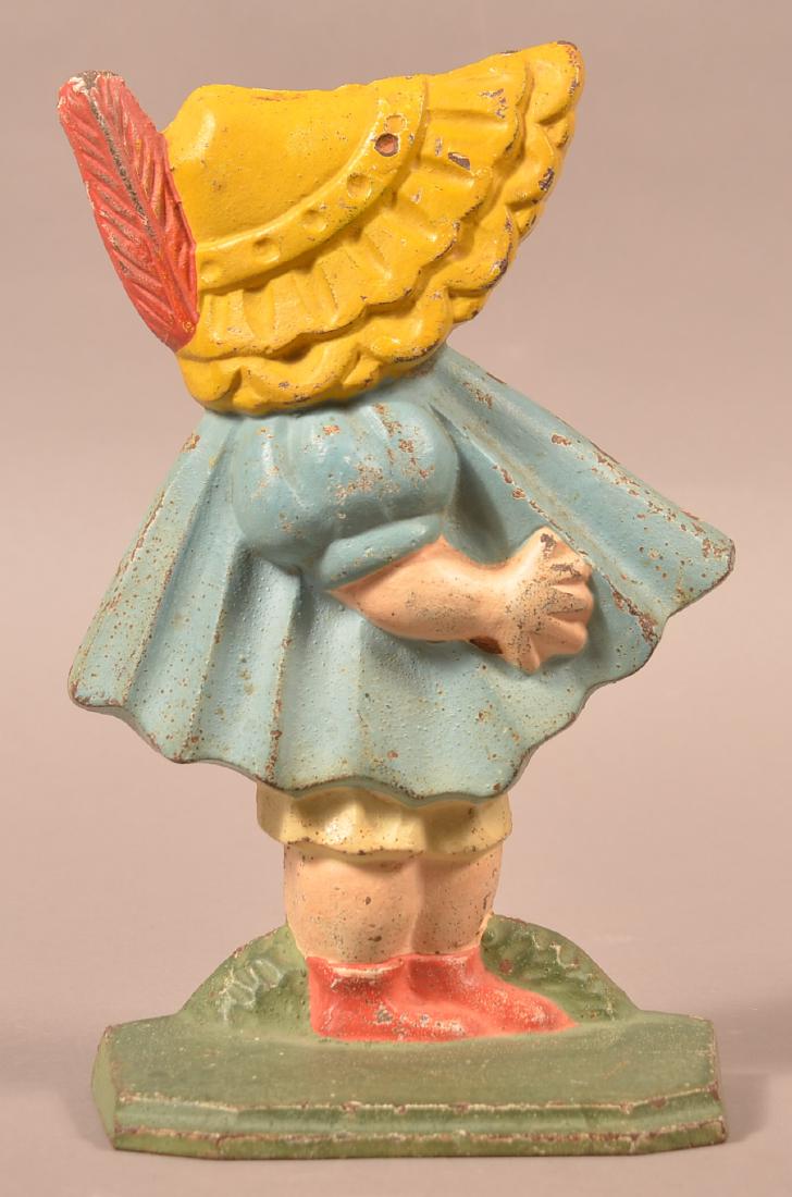 Hubley No. 121 Cast Iron Sunbonnet Doorstop.: Hubley No. 121 Cast Iron Sunbonnet Doorstop. 10"h. Condition: Good with minor wear, all original paint.