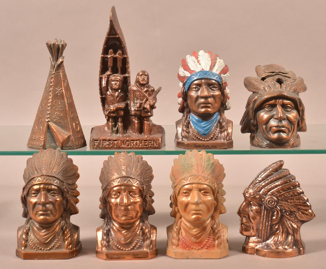 8 American Indian and Related Metal Still Banks. (1 of 3)