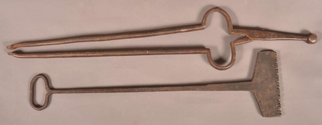 Two Pieces of 19th Century Iron.: Two Pieces of 19th Century Iron. Banding iron "J.W. CHAMBERS" and stamped on handle "McRoy, Philad." 22-1/2"l. and Fireplace tongs stamped "J.S." 28"l. Condition: Good.