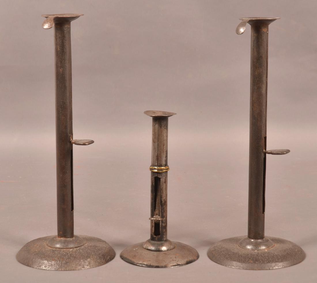 Three Antique Iron Hog Scraper Candlesticks. (1 of 4)