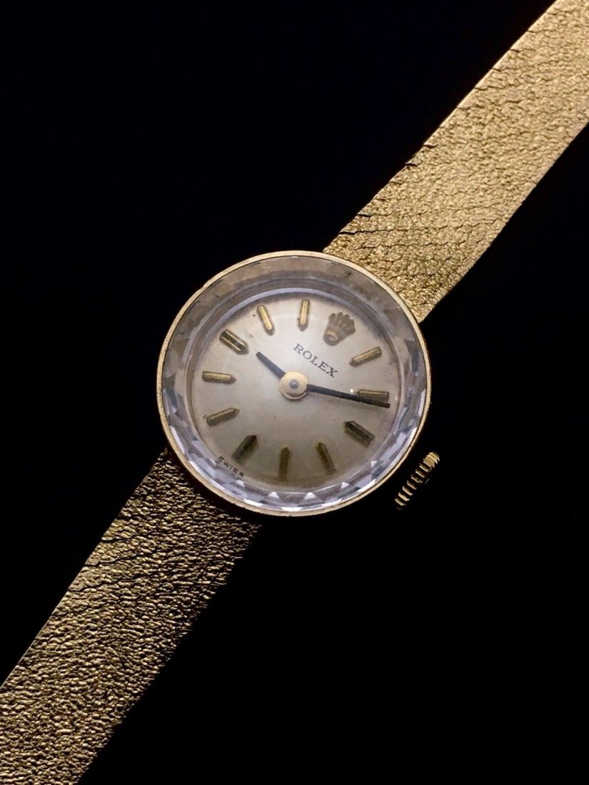 Vintage 14K Ladies Rolex Hand winding: Great condition for it's age. Movement Caliber 1400. Doesn't run and will need service. Measures in length is approx. 6 1/2" measures approx. 15mm in diamater