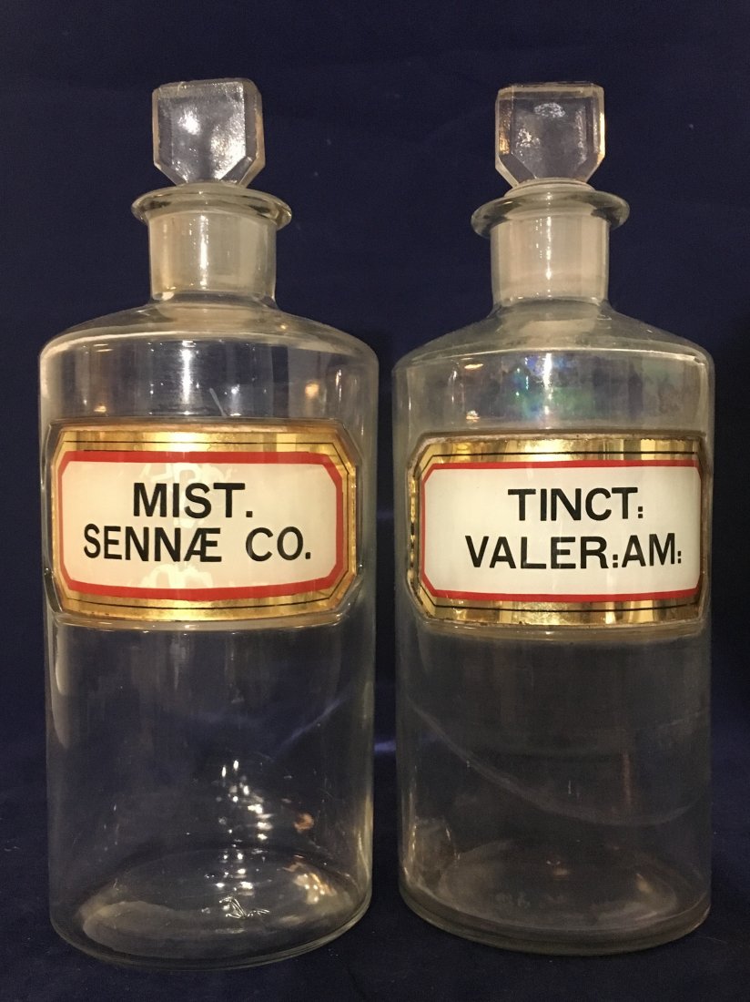 ANTIQUE LOT OF TWO APOTHECARY BOTTLES one is opalescent: ANTIQUE LOT OF TWO APOTHECARY BOTTLES - MEASURES APPROX 8 1/2" in Height. One of them seems to be an opalescent apothecary glass. . One is Marked TINCT VALER AM and the other one is marked MIST SENNAE