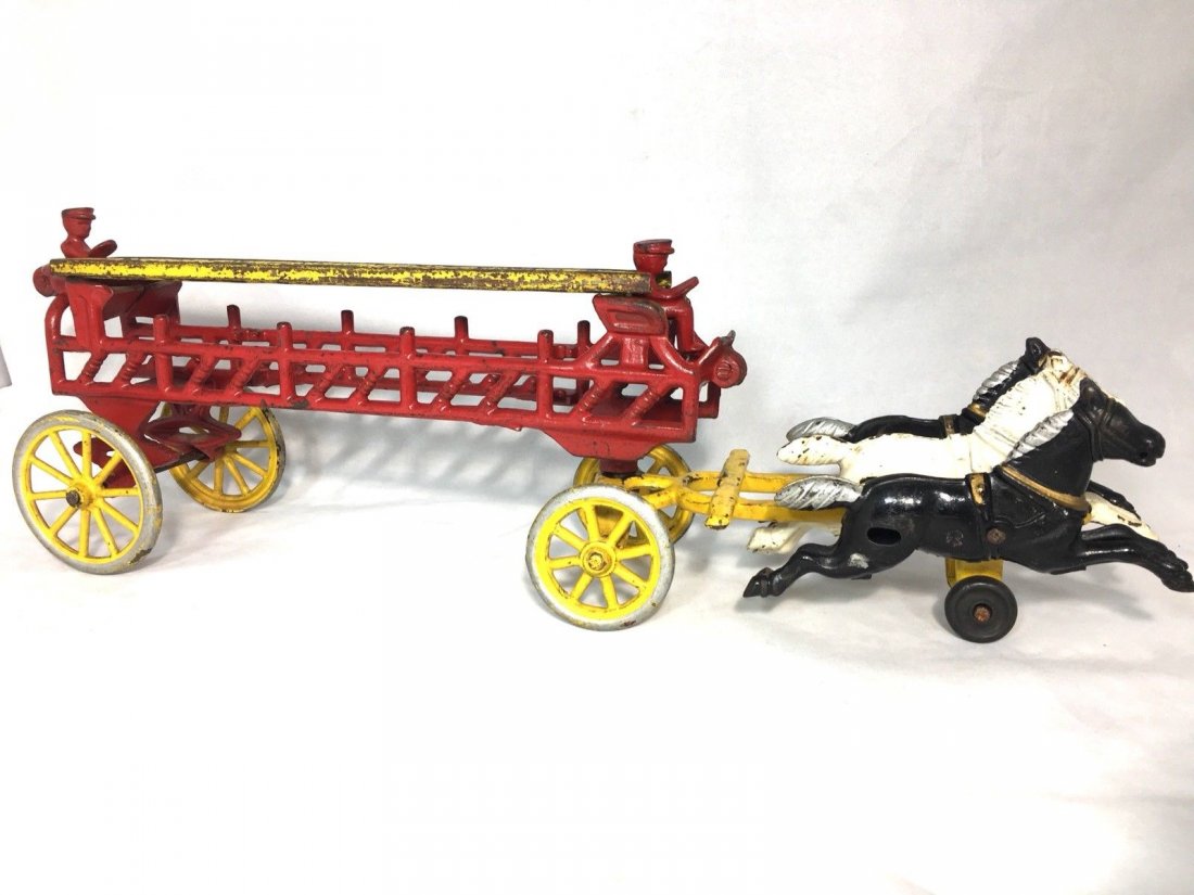 KENTON TOYS CAST IRON 16" Horse Drawn FIRE LADDER WAGON: KENTON TOYS CAST IRON 16" Horse Drawn FIRE LADDER WAGON- Seems to be original paint. Good Colors.Local shipping cost for this item is $30