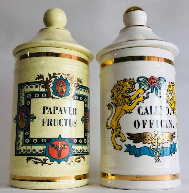 Lot of two Porcelain Antique Apothecary Bottles 11": Lot of two Colored Porcelain Antique Apothecary Bottles 11". Measures approx 11"" including the lid.Local shipping cost is $32