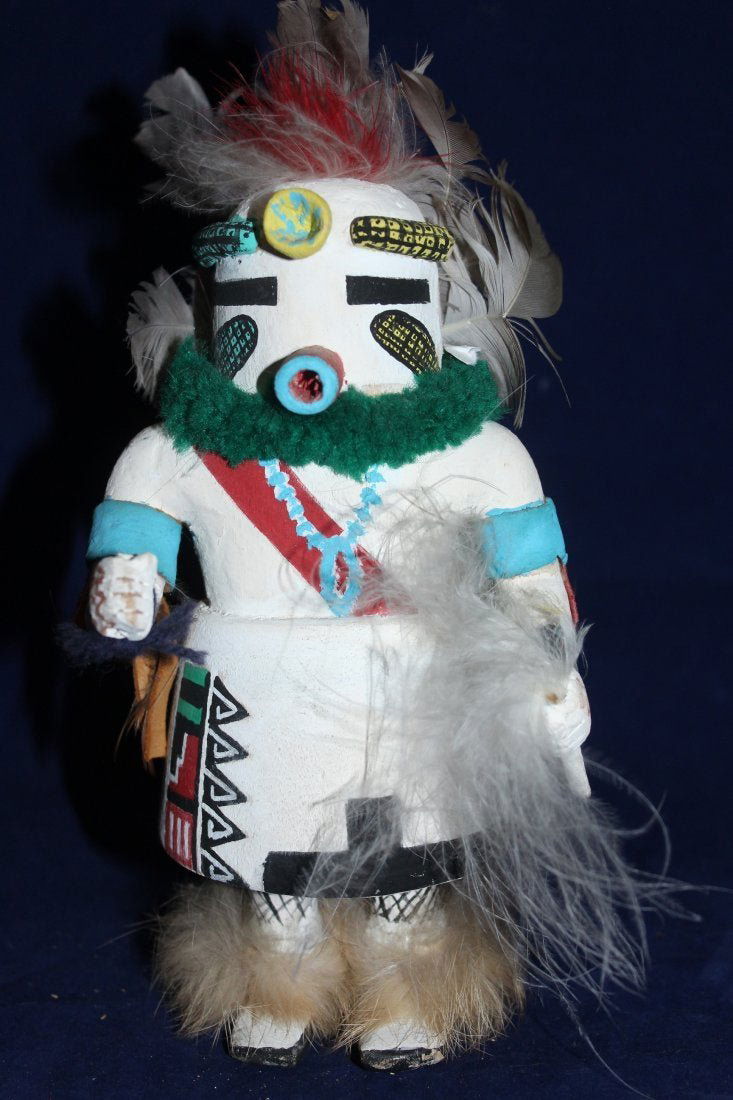 SignedImportant 11" Kachina Doll. Broken Ears: Important 11" Kachina Doll. Broken ears. Signed. Missing one object on the right hand . Local shipping cost is $25No pick up option