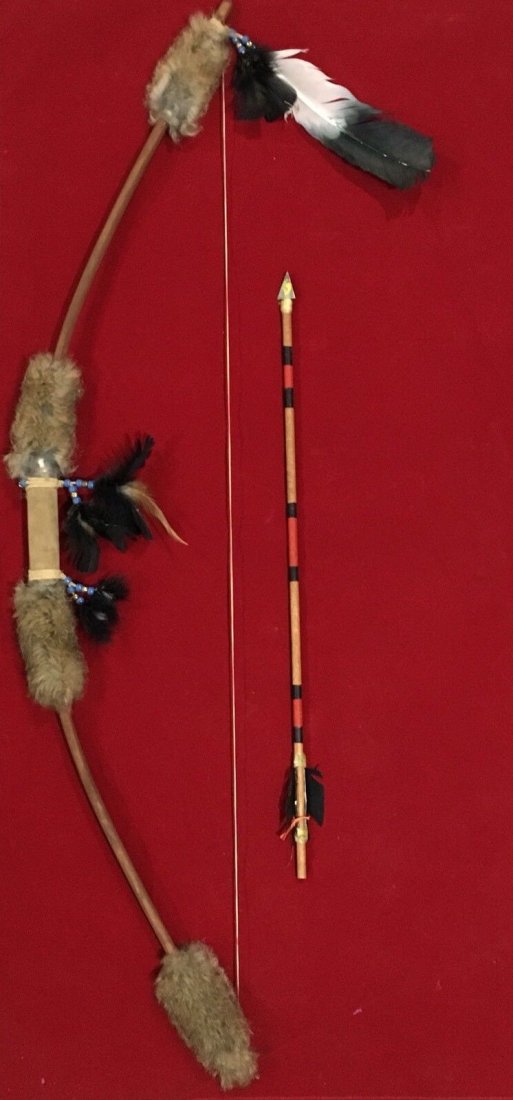 Native American Bow & Arrow: vintage ceremonial Native American Style Bow & Arrow, Hand-Crafted Wood/Hide/Feather 40" . Please notice that the arrow is very sharp and it can fly up to 8 foot. SHIPPING COST FOR THIS ITEM WITHIN TH