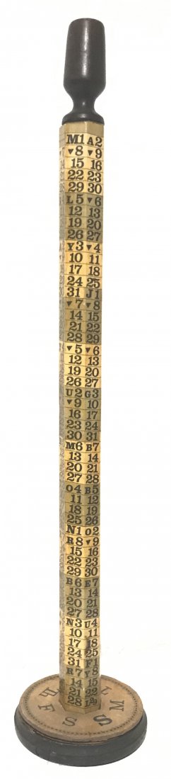 The Continuous Calendar 27 1/2" Tall: 19th century, calendar starts in 1794 and ends in 2119, turned wood and discus, reads "on the first day of March, rotate the disc so that Sunday aligns with the year." 27.5 in. Local shipping cost is 