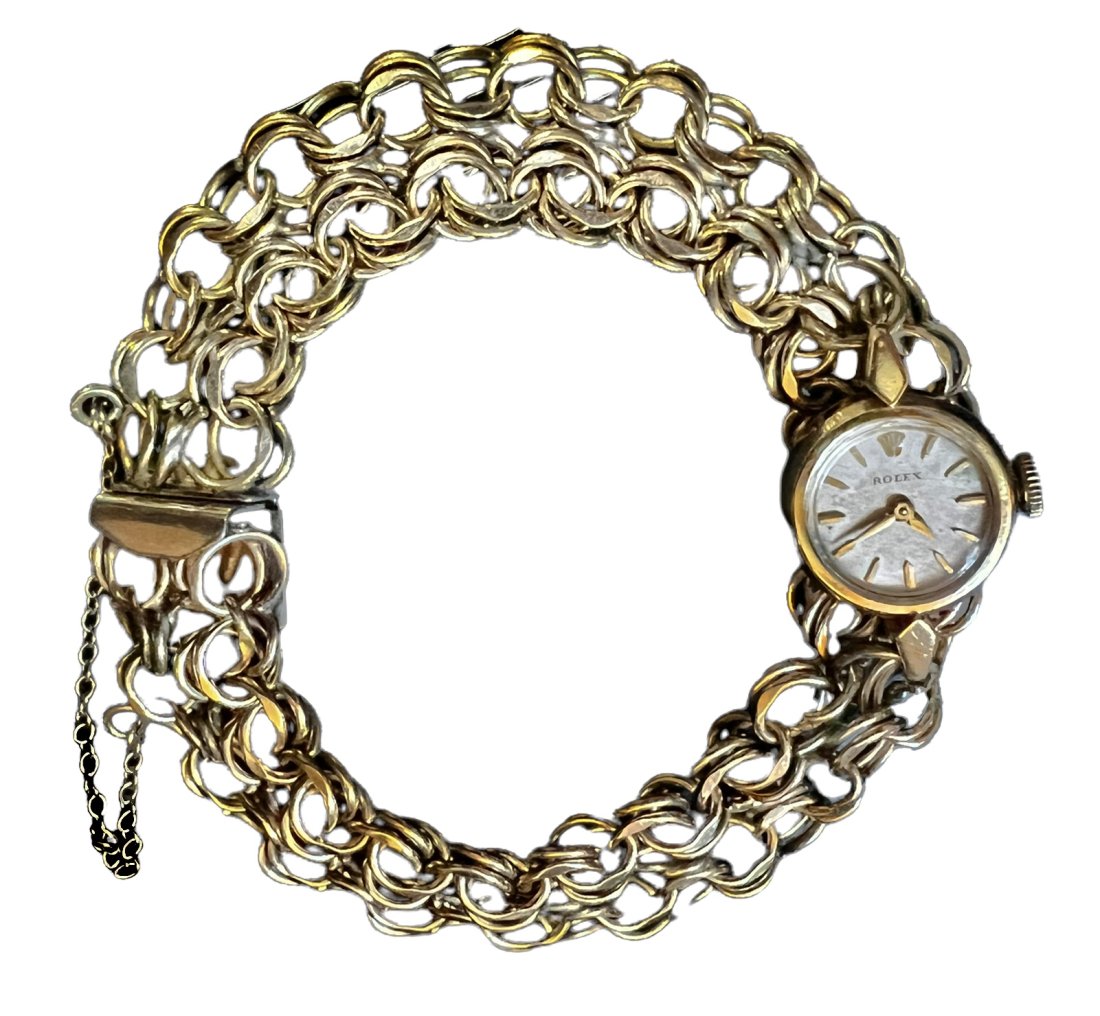 Vintage petite Ladies Rolex 17 jewels. 14K Solid yellow gold. Stamped case, movement and Dial 16mm: Petite little watch from the 50â€™s and 60â€™s. In running condition but was not tested for accuracy. Dial is in original aged condition. A wind up watch which works just fine as far as wind