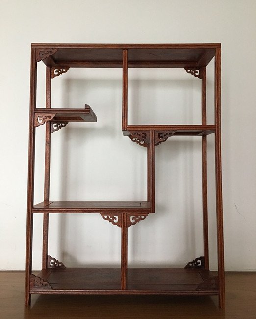 are Old Chinese Hainan Huanghuali Wood Curio Shelf: Rare Old Chinese Hainan Huanghuali Wood Curio Shelf ,concisely designed and a perfect copy of a Ming dynasty style , with auspicious clouds decorations , early 20th century , very precious wood near e