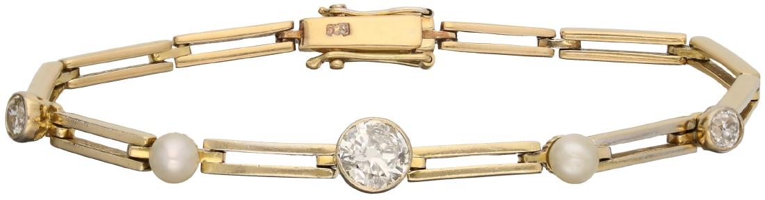 Bracelet yellow gold, ca. 1.15 ct. Diamond and pearl -: With 2 safety tips - 3 old European cut / brilliant cut diamonds (1x approx. 0.85 ct. (Brilliant) and 2x approx. 0.15 ct. (Old European cut) and pearl. Clarity: P, color: G - H. L: 18 cm.Weight: 14.37