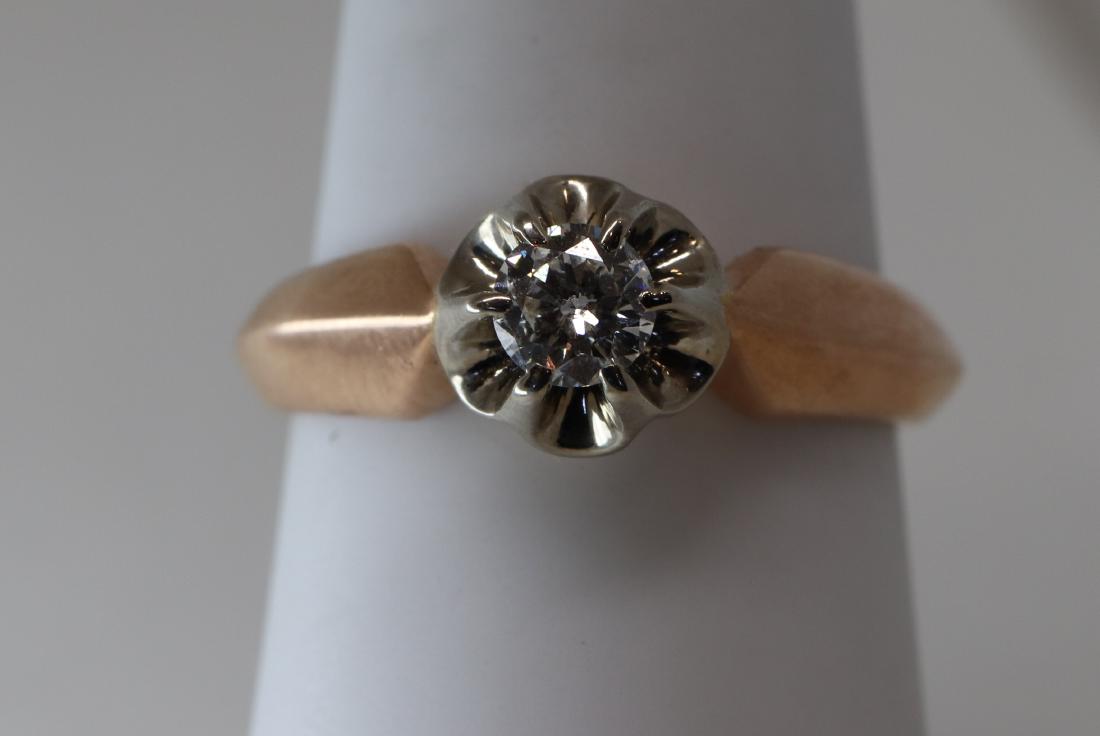 Vintage 14kÂ Solitare Diamond Ring: Vintage 14k Rose Gold solitaire ring with a diamond in the center weight approx. 0.40ct., VS2-SI1 F-G color.The ring weights 5.2g