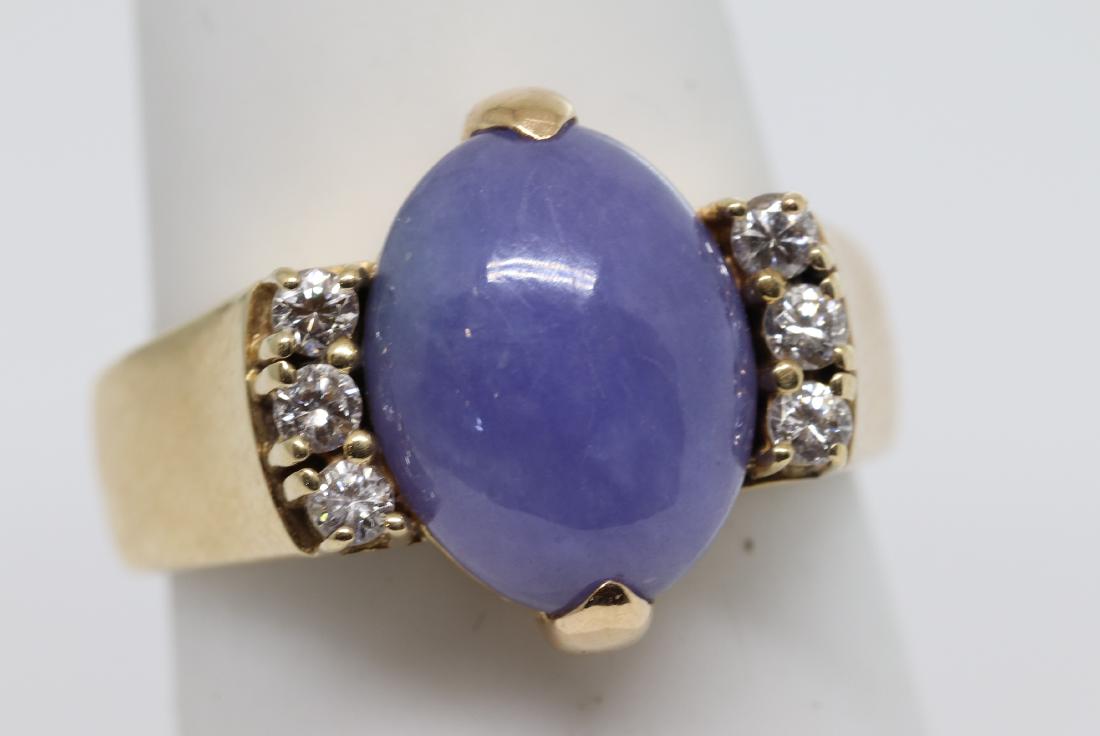 14k Yellow gold with Diamonds: Beautiful natural gemstone on center with 6 diamond on the sides 14k gold weight 8.5 grams