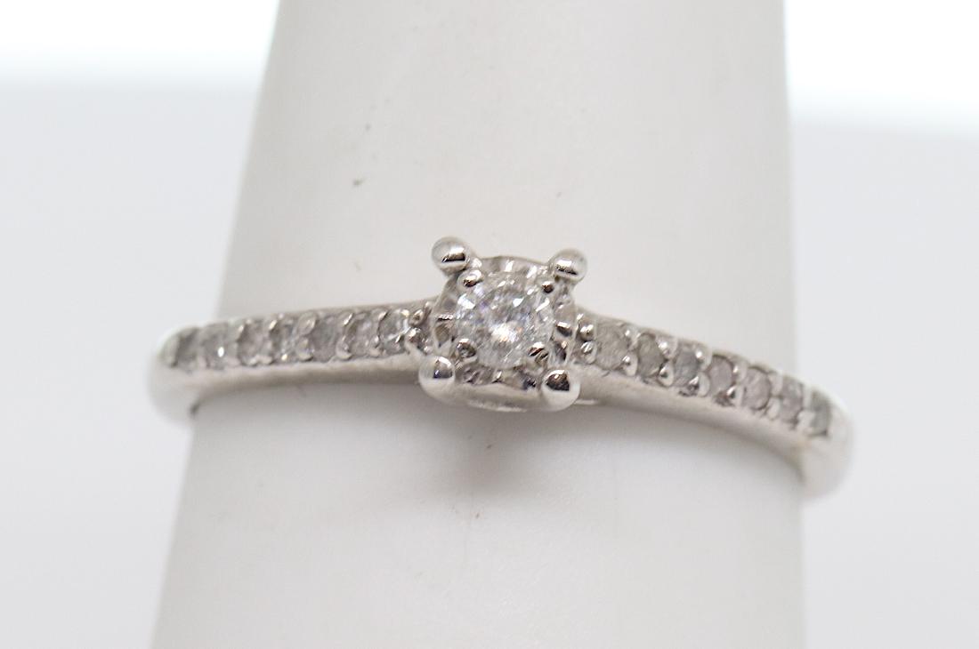 10k White Gold diamond ring with a total of 15 round (1 of 3)