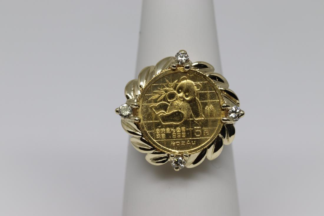 Panda Coin(24k)Ring: Unique 24k Panda coin ring. The coin is set in the center. There are a total of 4 round diamonds set around the coin. The diamonds are VS1-VS2 clarity. The ring is 14 karat yellow gold and weights in