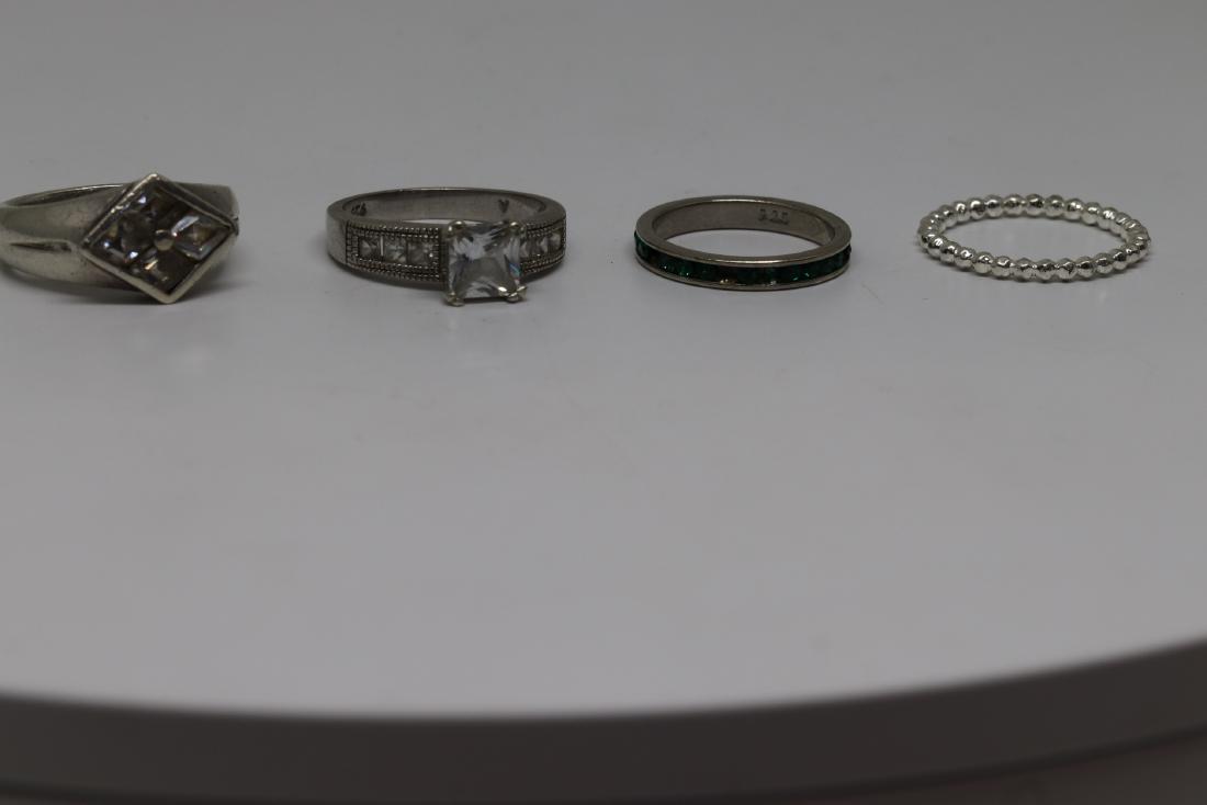 lot of 4 assorted rings (1 of 2)