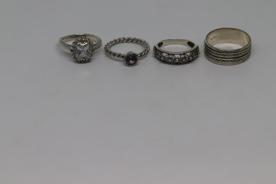 lot of 4 mixed rings 925 (1 of 3)