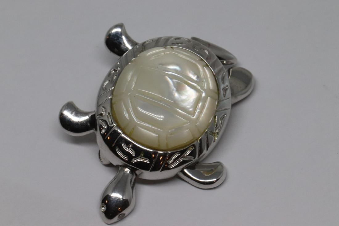 Silver Turtle Pendant: This is a pendant of a turtle and itâ€™s silver. Total weight is 11.1g