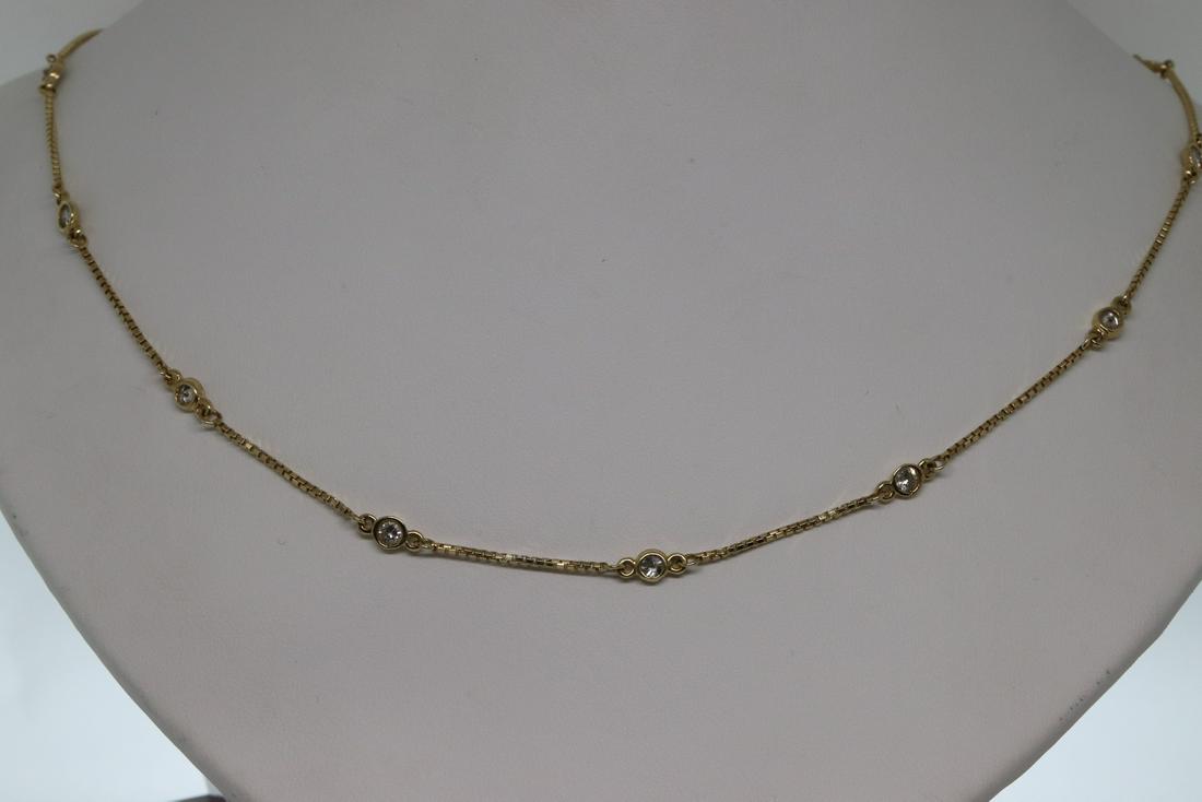 14Kt Diamond By The Yard: Beautiful 14Kt yellow gold diamond necklace. Style is inspired by Tiffany & Co. Total diamond: 12 Round Brilliant diamonds. Diamond Weight: approx 1.25-1.50tcw. Necklace length: 16in. Total weight: 4.