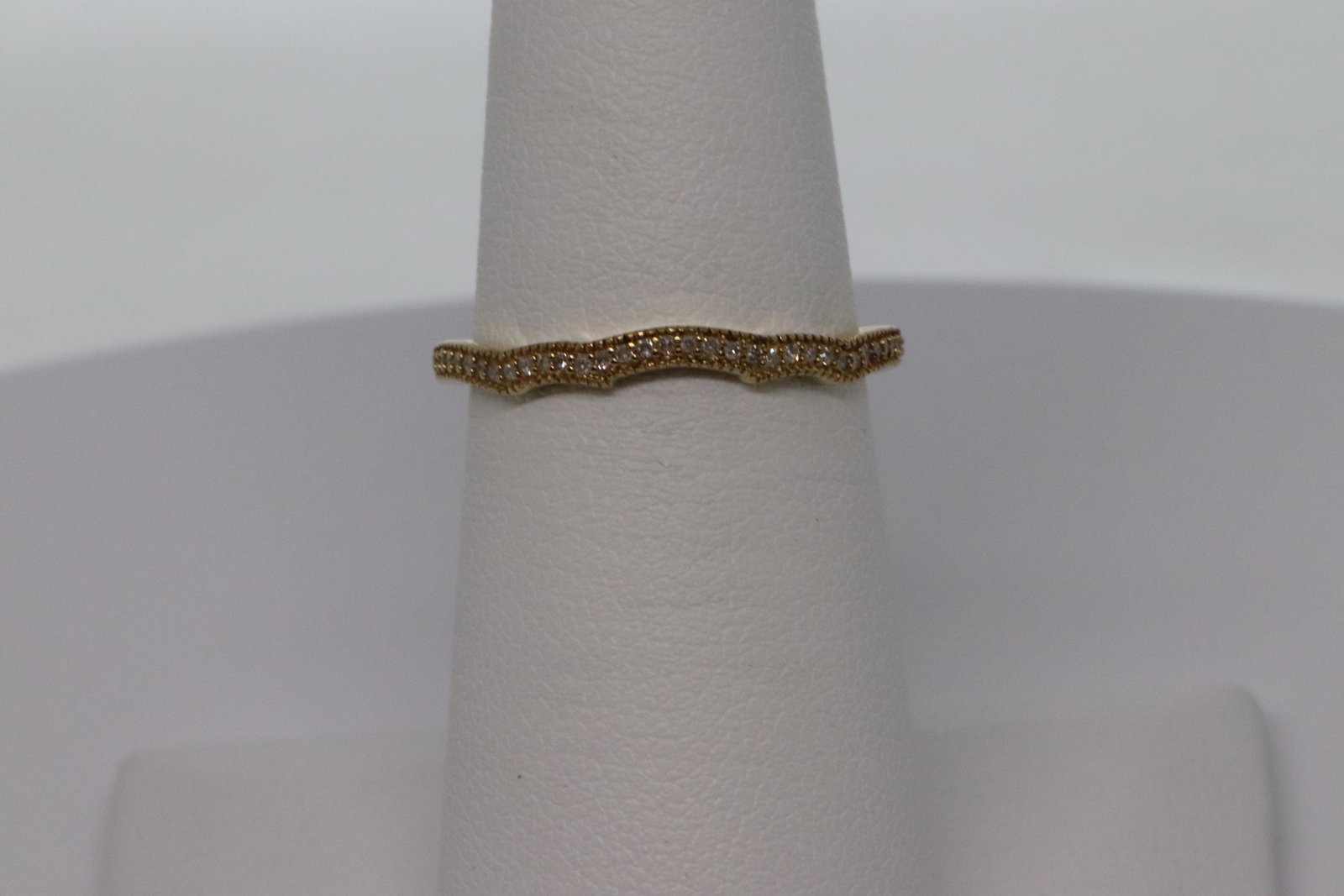 Stackable Diamond Band: A Beautiful Yellow Gold Diamond Band. The band has a total of 33 round diamonds. The ring is a 10kt Yellow gold, ring size is 6.00. SKU01UDH3