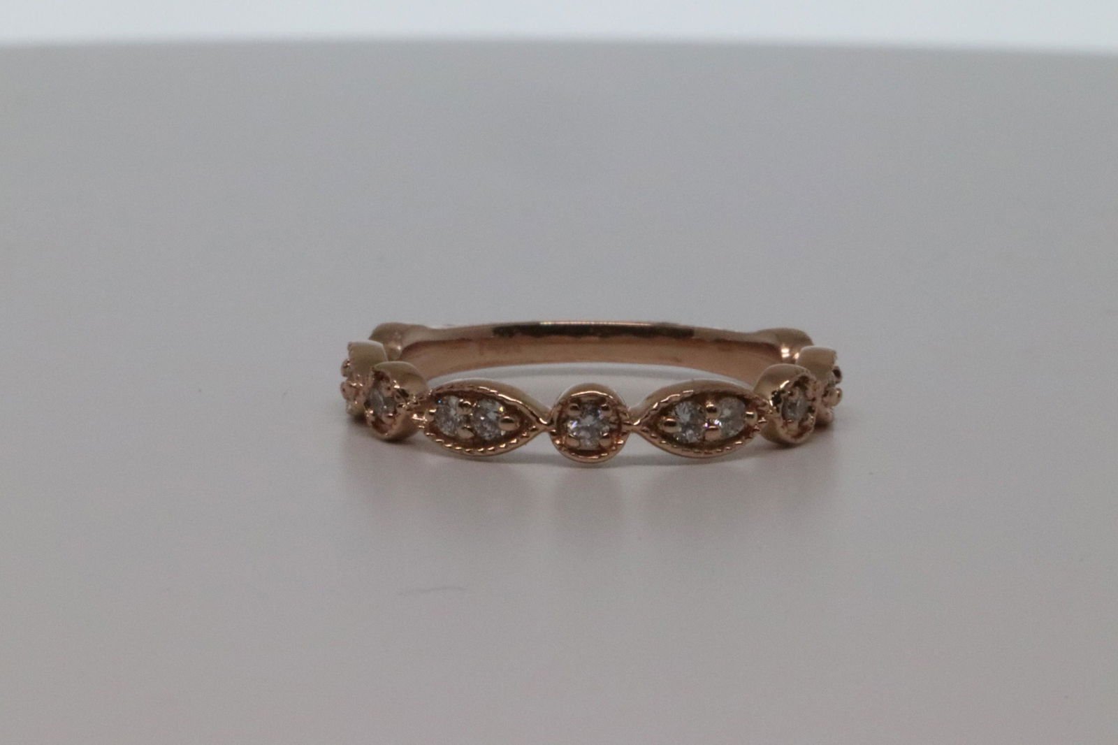 0.25 Round Diamond 14k Rose Gold Stackable Ring.: This is a 0.25 Round Diamond 14k Rose Gold Stackable Ring. This ring has approx CTW 0.25 13 round Diamond. Ring size is 5.75.