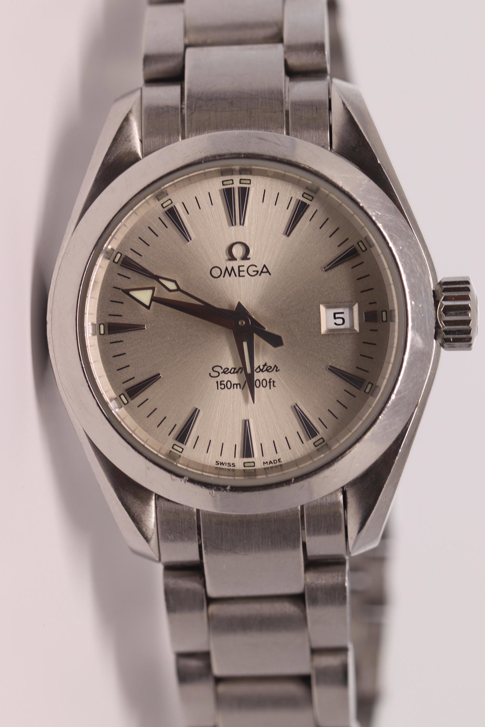 Omega Seamaster 150m: A ladies Omega Seamaster Aqua Terra 150m watch. The watch also has a date. The watch is in working condition.