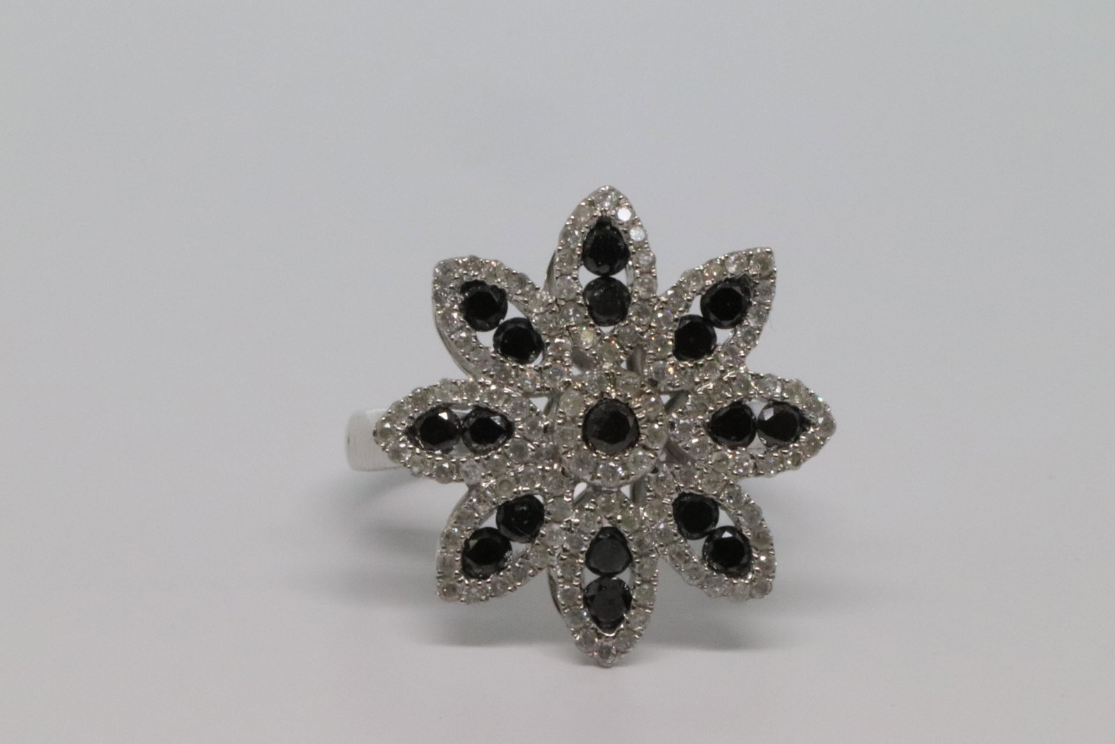 1.50 White & Black Diamond 14k White Gold Ring: This is a 14Kt White & Black Diamond. The ring has a total of approx 1.50cttw inlcuding black diamonds. Ring size 7.00. Total ring weight is 5g.
