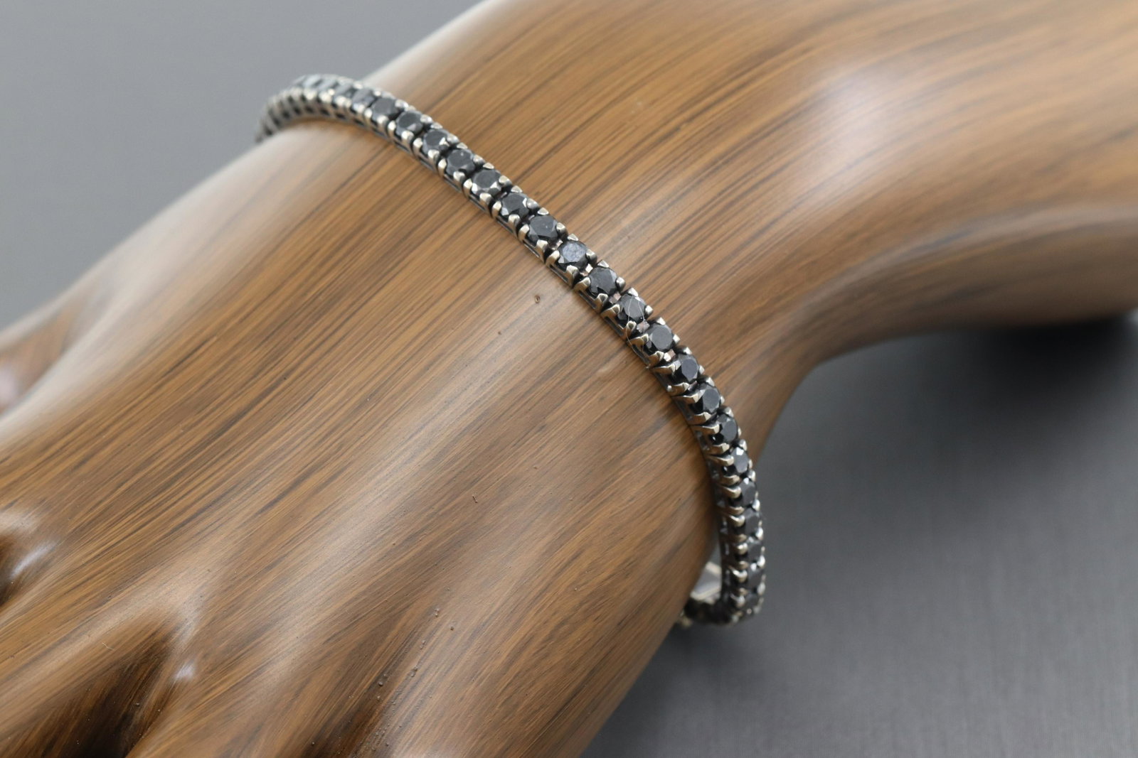 18Kt "CRIERI" Signed Black Diamond Bracelet: A gorgeous 18Kt "CRIERI" Signed Black Diamond whitee gold Bracelet. The bracelet has a total of 57 round black diamonds. Diamonds weigh approx 4.00cttw. Bracelet legnth: 8.00". Total weight is 10.80 g