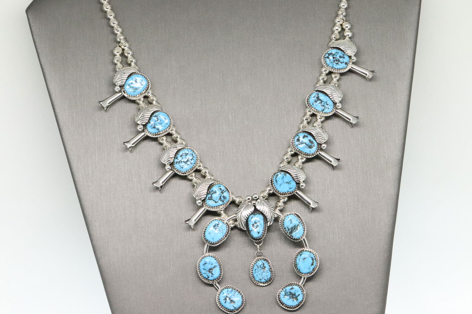 Navajo crafted sterling silver squash blossom necklace. (1 of 12)