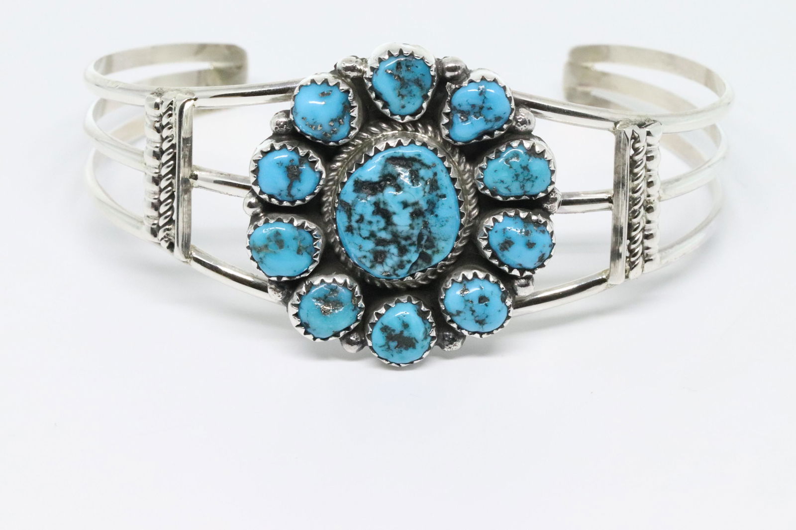 Navajo Sterling silver bracelet with a cluster of (1 of 4)