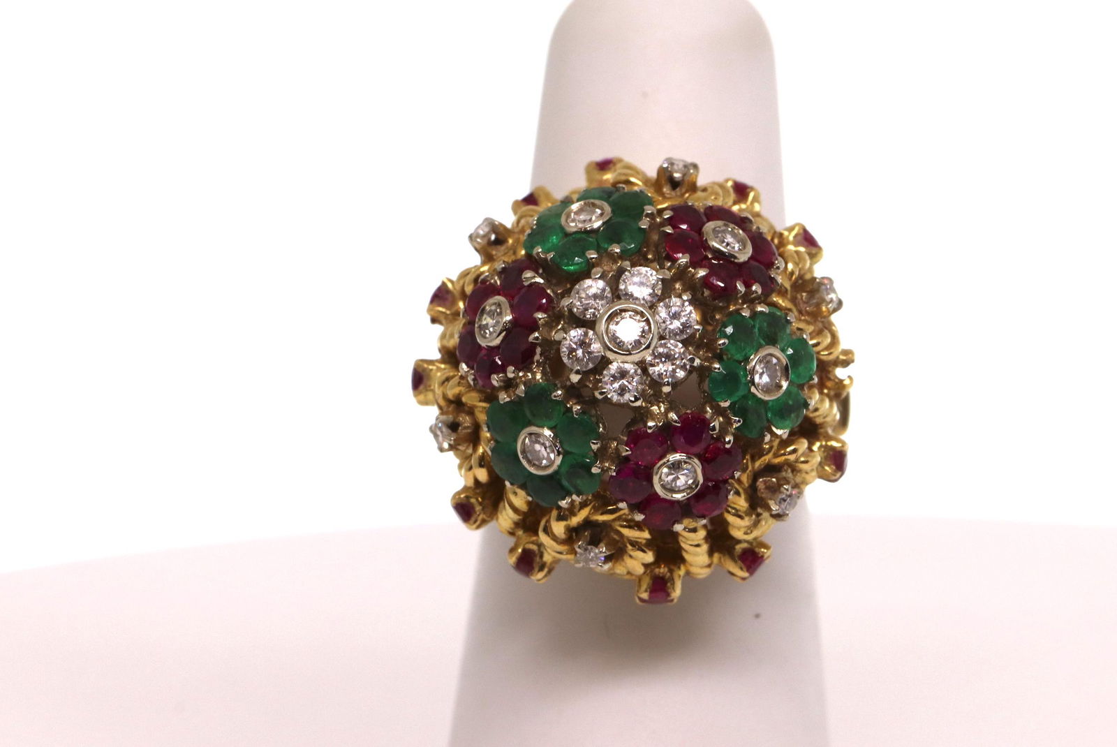 18k Vintage design Yellow gold Emerald ring: A ladies Gorgeous Cocktail vintage ring with diamonds, Ruby's and Emeralds. The diamonds weight approx 0.40cttw. The ring has beautiful detailed design around the center stones. Total weight of this r