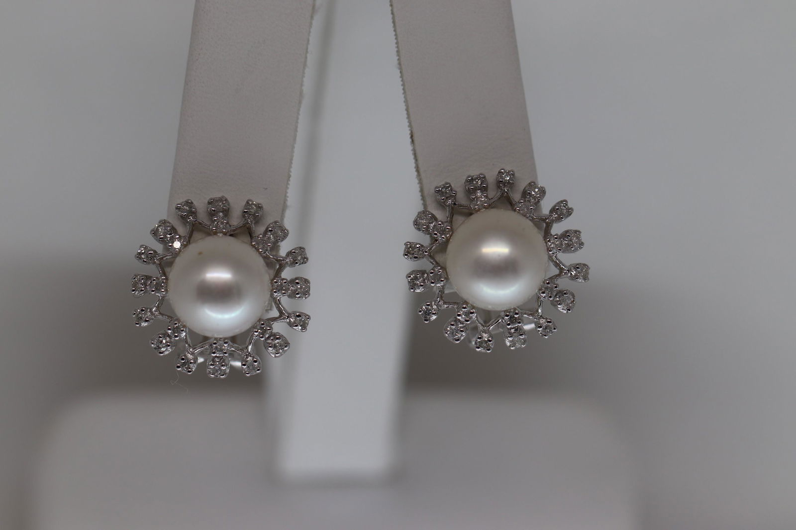pearl earrings with diamonds around