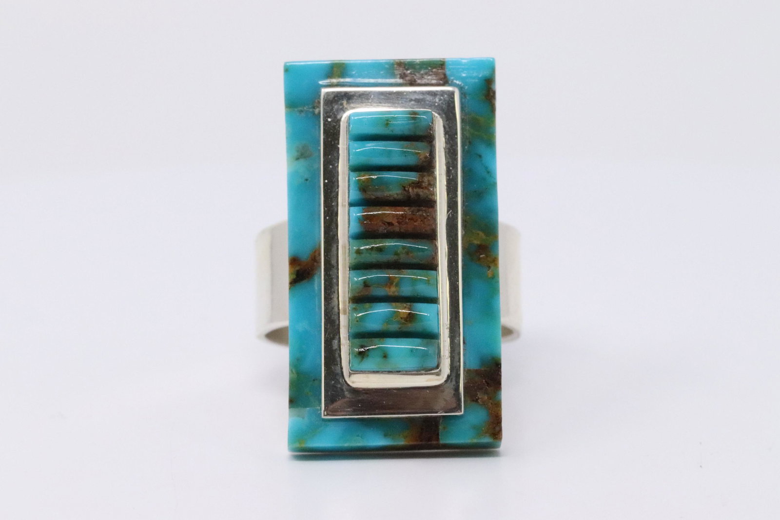 Navajo Larry Castillo Sterling Silver Turquoise Ring.: This is a Navajo Larry Castillo Sterling Silver Turquoise Ring. This ring is in a goodcondition. Ring size is 8.00.REF:IT99022123