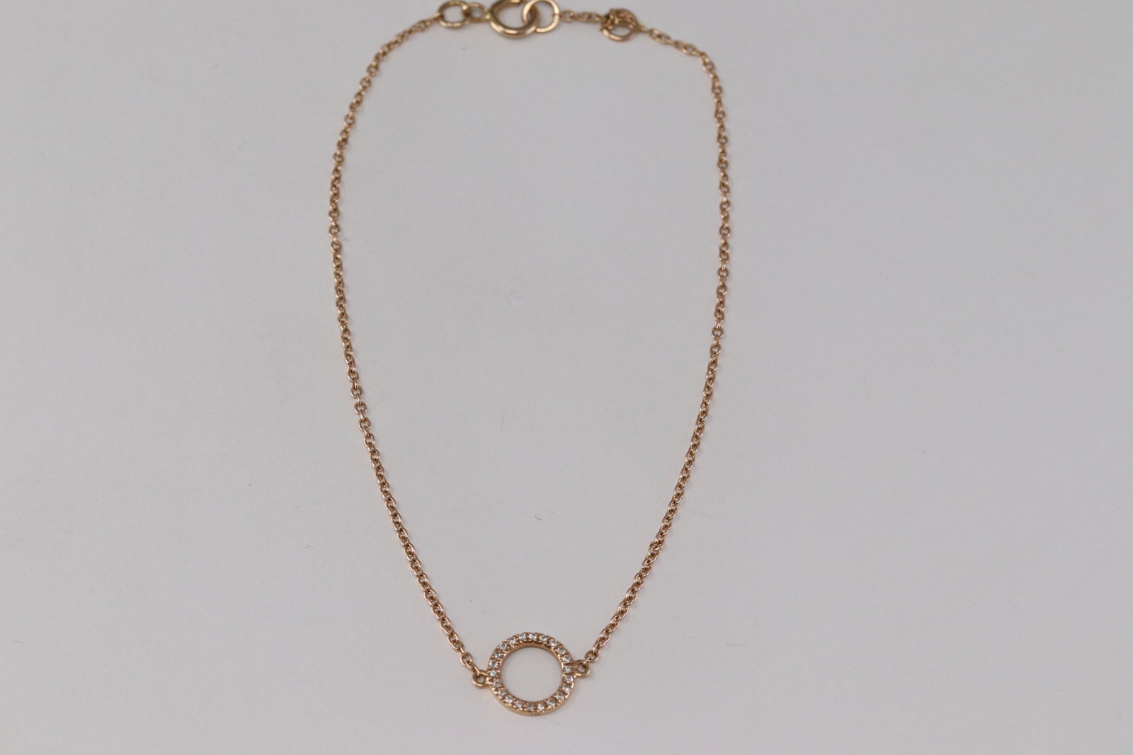 Ladies 14Kt Diamond Bracelet.: This is a 14kt rose gold diamond bracelet. This bracelet has 23 round brilliant diamonds. Bracelet Size is 7.