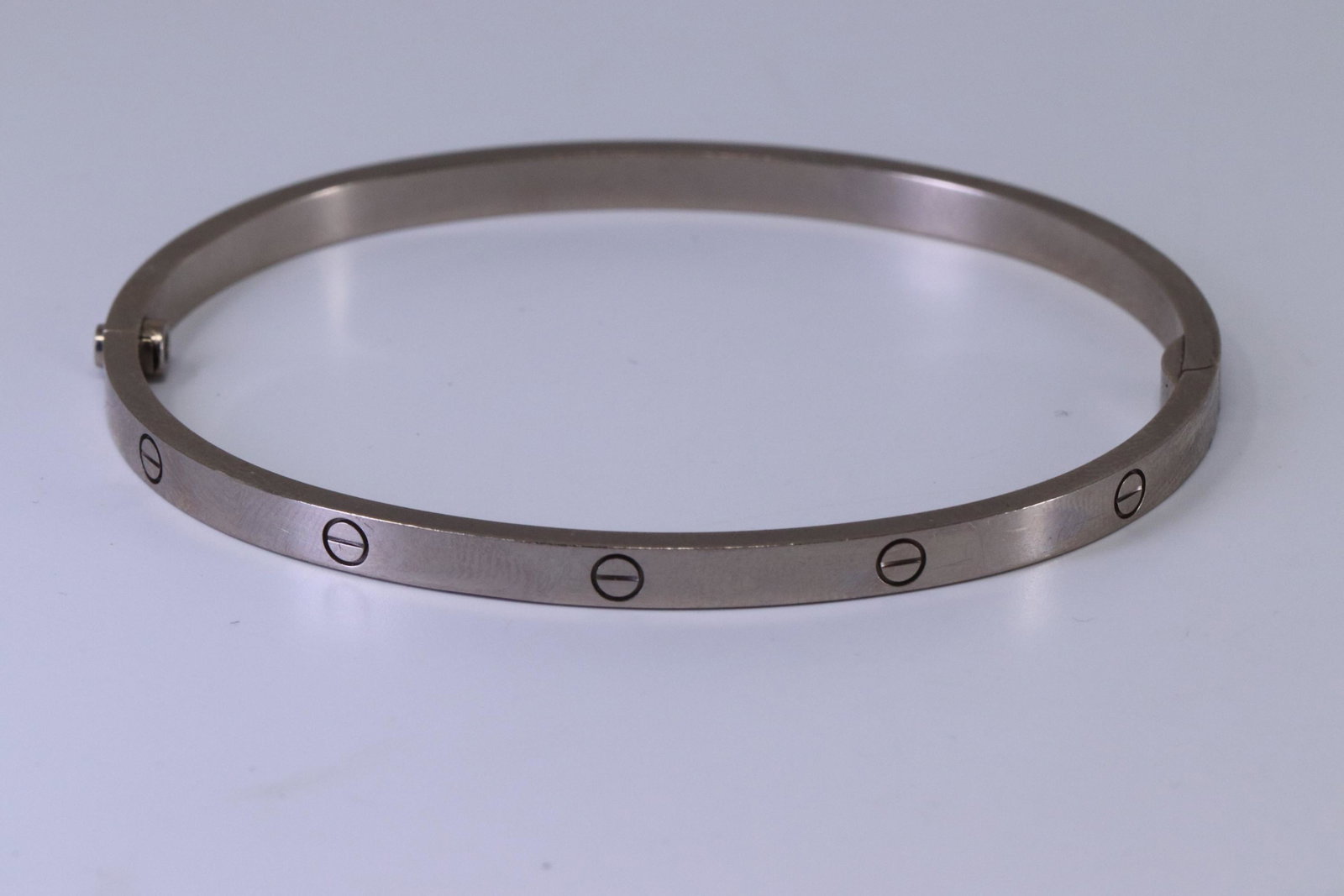 Authentic Cartier Love Bracelet 18Kt White Gold: A Authentic Cartier Love Bracelet 18kt White Gold. Size: 18. Normal wear and scratches. Weight: 21.90 grams.