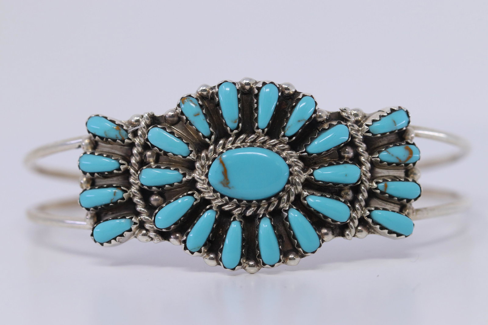 Navajo Handmade Sterling Silver Turquoise Cluster: This is a Navajo Handmade Sterling Silver Turquoise Cluster Bracelet By Pam Benally. REF:I398T5312