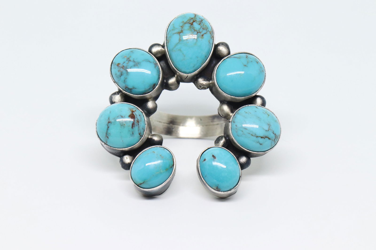 Navajo Handmade Kingman Naja Ring Set In Sterling: This is a Navajo Handmade Kingman Naja Ring Set In Sterling Silver By Robert Shakey. Ring size is 4.00. REF:I442D905