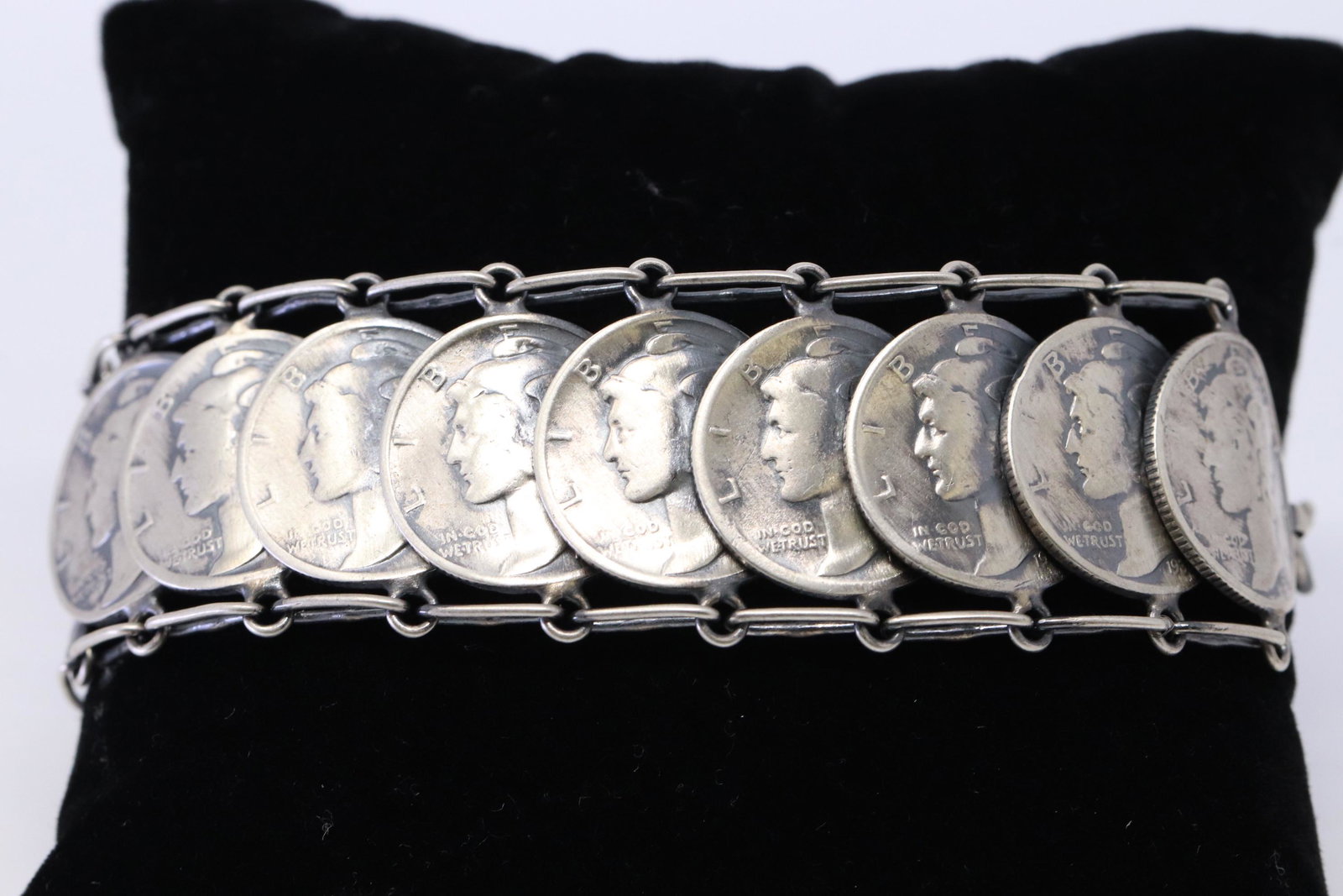 Navajo Handmade by James McCabe Silver Liberty Dime: This is a Navajo Handmade by James McCabe Silver Liberty Dime Bracelet with Turquoise.