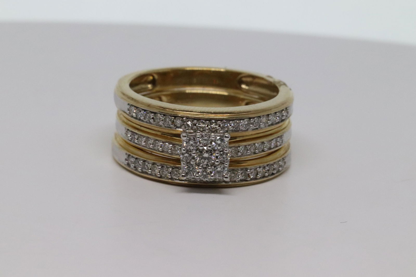 1/2ct Bridal Set Diamond ring: A beautiful 1/2ctw ladies diamond bridal ring. The ring are 3 rings connected together. The size:6.75. The gold: 10kt yellow gold. SKU:FIEH4A