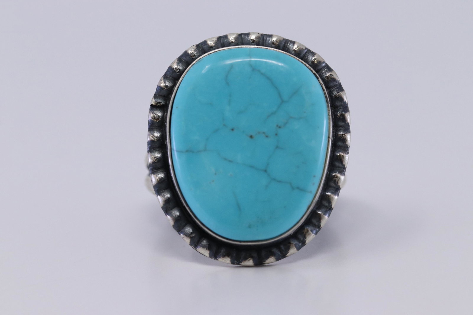 Kingman Turquoise Ring with Sterling Silver by Navajo: This is a Kingman Turquoise Ring with Sterling Silver by Navajo Artist Eli Skeets. Ring size is 7.00.