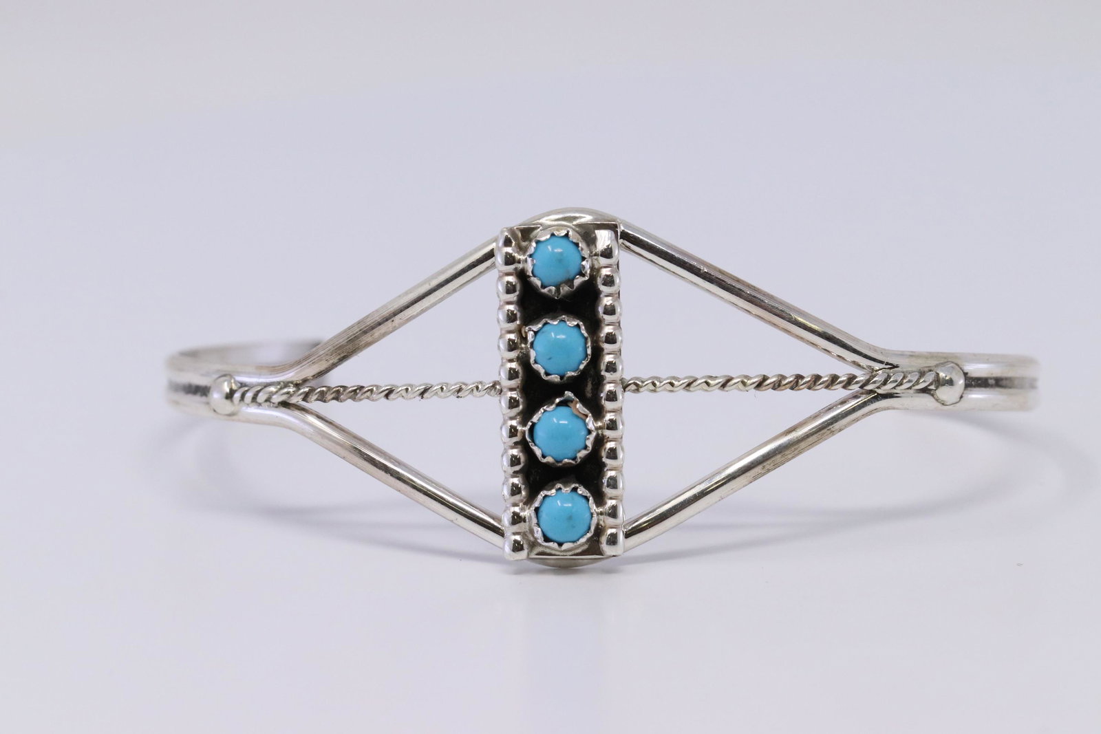 Native American Navajo Handmade Sterling Silver: This is a Native American Navajo Handmade Sterling Silver Turquoise Bracelet By Janice Spencer